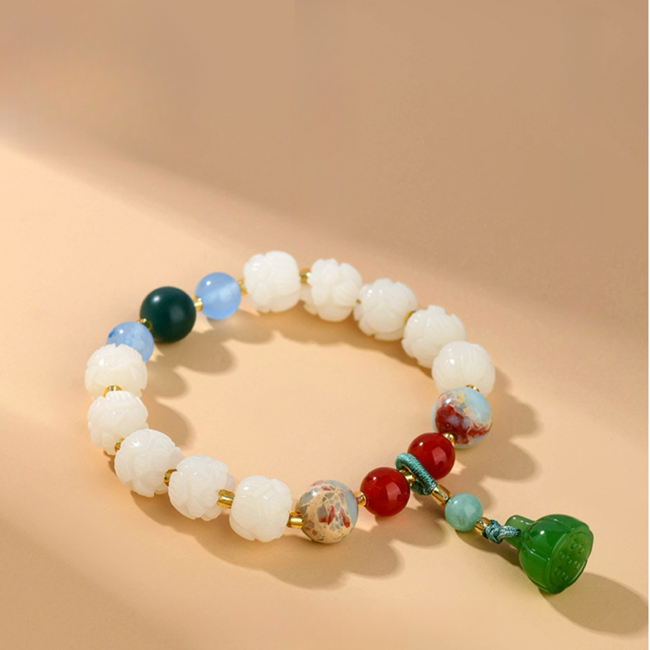 Claming White Jade Bodhi & Energizing Red Agate Bracelet